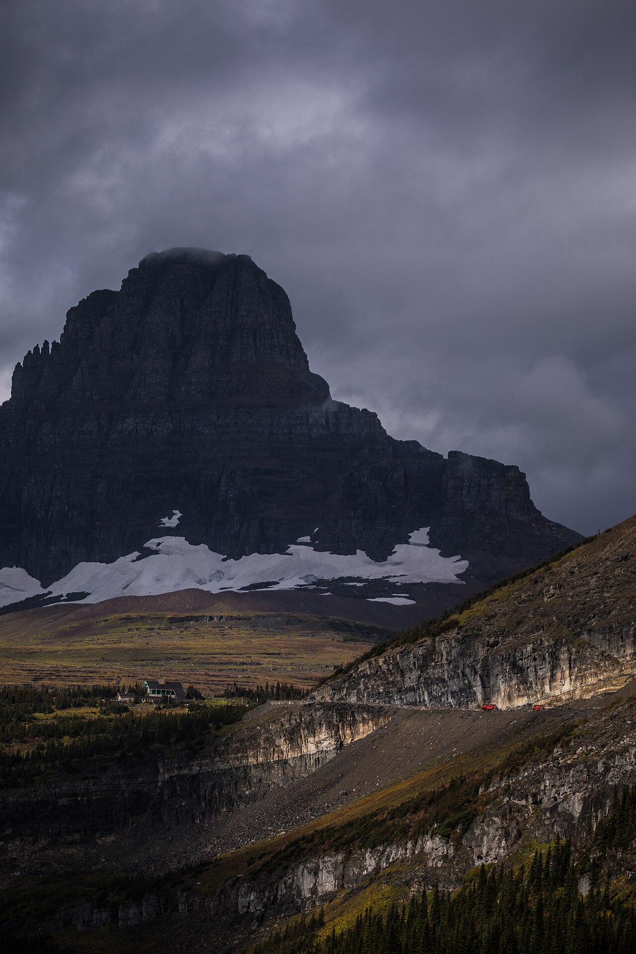 The dramatic alpine curves of Going-to-the-Sun Road winding below Clements Mountain at Logan Pass in Glacier National Park